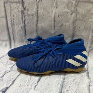 Blue Adidas Nemesis Cleats with White Accents